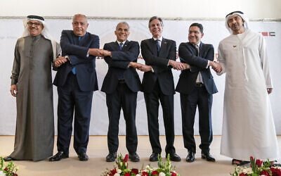 After meeting for the Negev Summit, Bahrain's Foreign Minister Abdullatif bin Rashid al-Zayani, left, Egypt's Foreign Minister Sameh Shoukry, Israel's Foreign Minister Yair Lapid, U.S. Secretary of State Antony Blinken, Morocco's Foreign Minister Nasser Bourita, and United Arab Emirates' Foreign Minister Sheikh Abdullah bin Zayed Al Nahyan, pose for a photograph Monday, March 28, 2022, in Sde Boker, Israel. (AP Photo/Jacquelyn Martin, Pool)