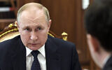 Russian President Vladimir Putin attends a meeting in Moscow, Russia, March 29, 2022. (Mikhail Klimentyev, Sputnik, Kremlin Pool Photo via AP)