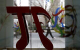 A door handle in the shape of pi is seen at the National Museum of Mathematics in New York, December 17, 2012. The museum is aimed at kids aged 8 to 13, and curators have given the place a playground feel. (AP Photo/Seth Wenig)