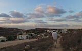 Illustrative: Evening falls over the illegal West Bank outpost of Havat Gilad, on August 26, 2009. (Nati Shohat/Flash90)