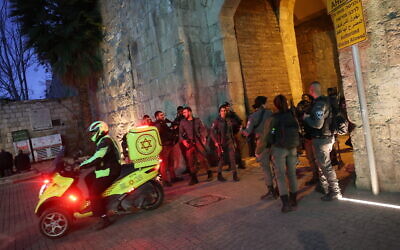Israeli security forces at the scene of a stabbing attack in Jerusalem's Old City, on March 7, 2022. (Yonatan SindelFlash90)