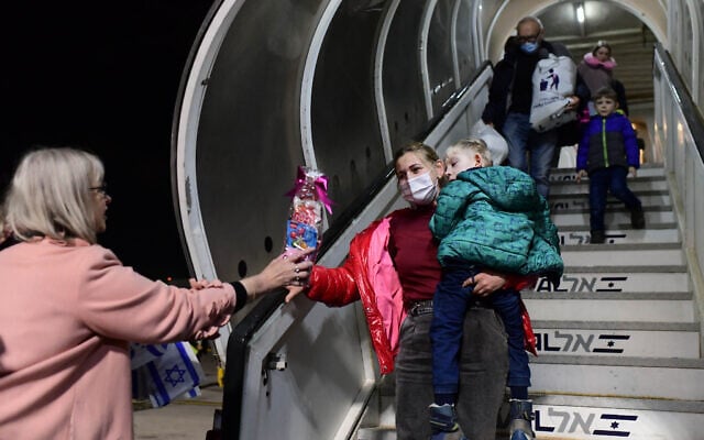 Jewish immigrants fleeing the war in Ukraine arrive at Ben Gurion airport near Tel Aviv on March 9, 2022. (Tomer Neuberg/ Flash90) Jewish immigrants fleeing the war in Ukraine arrive at Ben Gurion airport near Tel Aviv on March 9, 2022. (Tomer Neuberg/ Flash90)