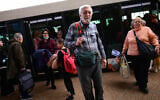 Refugees fleeing the fighting in Ukraine arrive at Ben Gurion Airport near Tel Aviv, on March 15, 2022. (Tomer Neuberg/Flash90)
