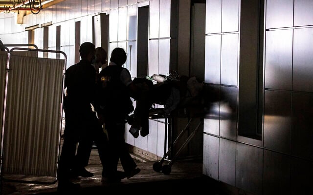 A man who was stabbed and seriously hurt in a terror attack in the West Bank is brought to the Shaare Zedek Medical Center in Jerusalem, March 31, 2022. (Olivier Fitoussi/FLASH9) A man who was stabbed and seriously hurt in a terror attack in the West Bank is brought to the Shaare Zedek Medical Center in Jerusalem, March 31, 2022. (Olivier Fitoussi/FLASH9)