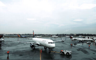 Illustrative: Delta planes sitting on the tarmac at LaGuardia Airport in New York City, Nov. 22, 2017. (Spencer Platt/Getty Images via JTA)