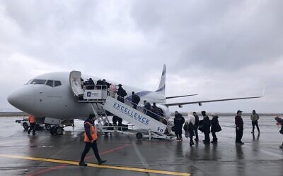 Refugees board a flight to Israel at Iasi Airport in Romania, on March 3, 2022. (The Times of Israel)