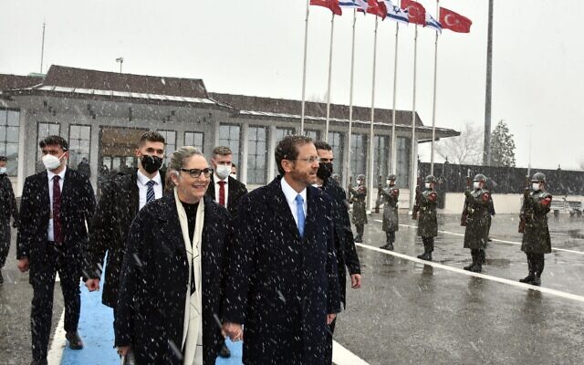 President Isaac Herzog and his wife Michal board a plane to Israel after concluding a state visit to Turkey on March 10, 2022 (GPO) President Isaac Herzog and his wife Michal board a plane to Israel after concluding a state visit to Turkey on March 10, 2022 (GPO)