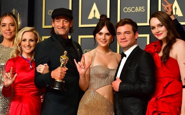 The cast of CODA hold their award for Best Picture in the press room during the 94th Oscars at the Dolby Theatre in Hollywood, California on March 27, 2022. (Frederic J. Brown/AFP via Getty Images/JTA) The cast of CODA hold their award for Best Picture in the press room during the 94th Oscars at the Dolby Theatre in Hollywood, California on March 27, 2022. (Frederic J. Brown/AFP via Getty Images/JTA)