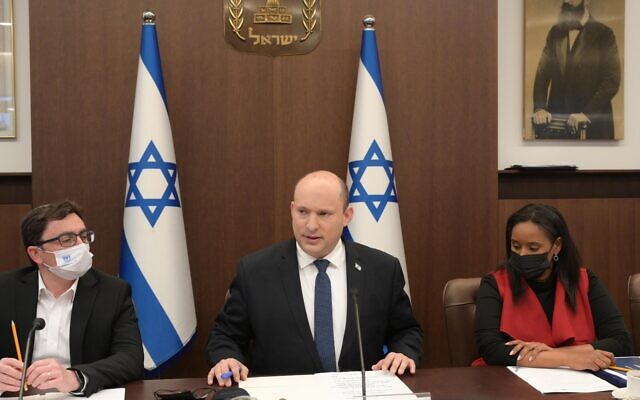 Prime Minister Naftali Bennett, center, and Aliyah and Integration Minister Tamano-Shata, right, at a meeting of the Ministerial Committee on Aliyah and Integration, March 7, 2022. (Amos Ben-Gershom/GPO) Prime Minister Naftali Bennett, center, and Aliyah and Integration Minister Tamano-Shata, right, at a meeting of the Ministerial Committee on Aliyah and Integration, March 7, 2022. (Amos Ben-Gershom/GPO)