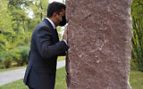 Ukrainian President Volodymyr Zelensky commemorates Holocaust victims at the at the Babyn Yar Holocaust Memorial Center in Kyiv, Ukraine in April 2021. (Courtesy of the Babyn Yar Holocaust Memorial Center via JTA)