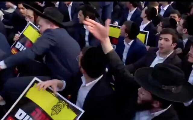Ultra-Orthodox demonstrators block a Route 4 on March 8, 2022. (Screen capture/Channel 12) Ultra-Orthodox demonstrators block a Route 4 on March 8, 2022. (Screen capture/Channel 12)