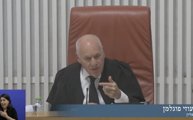 Supreme Court Justice Uzi Fogelman at a court hearing on a petition against the government's cap on Ukrainian refugees, March 20, 2022. (Screen capture: Twitter) Supreme Court Justice Uzi Fogelman at a court hearing on a petition against the government's cap on Ukrainian refugees, March 20, 2022. (Screen capture: Twitter)