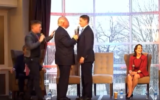 Mike Gibbons (C) and Josh Mandel get into a near-physical altercation during a debate of Republican candidates for Ohio senator on March 18, 2022. (Screen capture/Twitter)