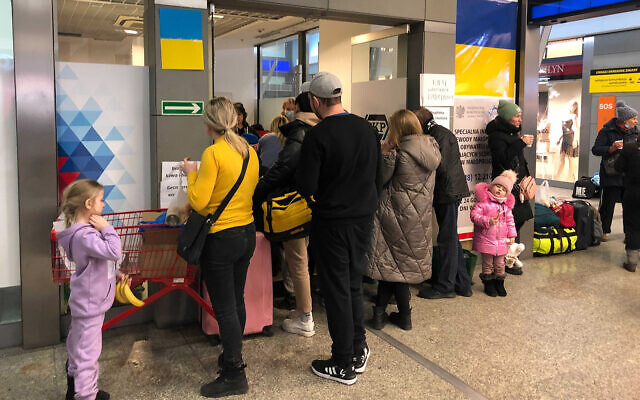 Ukrainian refugees wait at an absorption office at Krakow’s central train station. (Lazar Berman/Times of Israel) Ukrainian refugees wait at an absorption office at Krakow’s central train station. (Lazar Berman/Times of Israel)