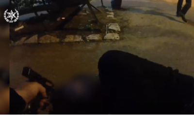 Body camera footage released by police on March 30, 2022, showing Palestinian terrorist Diaa Hamarsheh, 27, neutralized by an officer after killing four civilians and one officer in Bnei Brak on March 29, 2022. (screen grab / Israel Police)