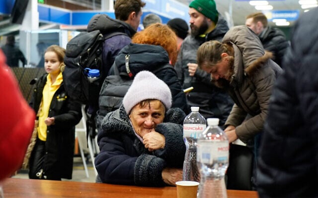 Evacuees from Mariupol at a shopping center on the outskirts of the city of Zaporizhzhia, which is now a registration centre for displaced people, on March 16, 2022. (Emre Caylak/AFP) Evacuees from Mariupol at a shopping center on the outskirts of the city of Zaporizhzhia, which is now a registration centre for displaced people, on March 16, 2022. (Emre Caylak/AFP)