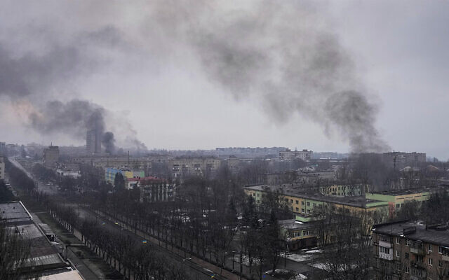 Smoke rises after shelling in Mariupol, Ukraine, on March 9, 2022. (AP Photo/Evgeniy Maloletka) Smoke rises after shelling in Mariupol, Ukraine, on March 9, 2022. (AP Photo/Evgeniy Maloletka)