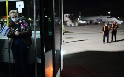 Illustrative: Jewish immigrants fleeing the war in Ukraine on a rescue flight sponsored by Keren Hayesod arrive at Ben Gurion airport near Tel Aviv, on March 9, 2022. (Tomer Neuberg/Flash90)