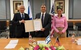 Public Security Minister Omer Barlev, US Department of Homeland Security Under Secretary for Policy Robert Silvers and interior Minister Ayelet Shaked sign an information-sharing agreement in Jerusalem on March 2, 2022. (Courtesy)