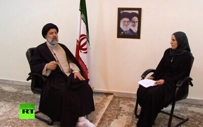 Catherine Perez-Shakdam, a French woman of Jewish heritage, interviews future Iranian President Ebrahim Raisi in Mashad in May 2017 (Screenshot: Russia Today)
