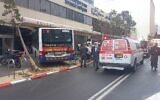 Medics at the scene of a bus crash in Tel Aviv, March 13, 2022. (Magen David Adom)