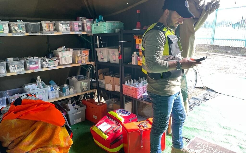 An Israeli volunteer at the border crossing between Poland and Ukraine, at Medyka, Poland, March 15, 2022. (Carrie Keller-Lynn/The Times of Israel)