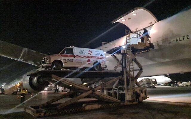 A bulletproof MDA ambulance is loaded onto a flight at Ben Gurion Airport, on March 16, 2022. (Magen David Adom) A bulletproof MDA ambulance is loaded onto a flight at Ben Gurion Airport, on March 16, 2022. (Magen David Adom)