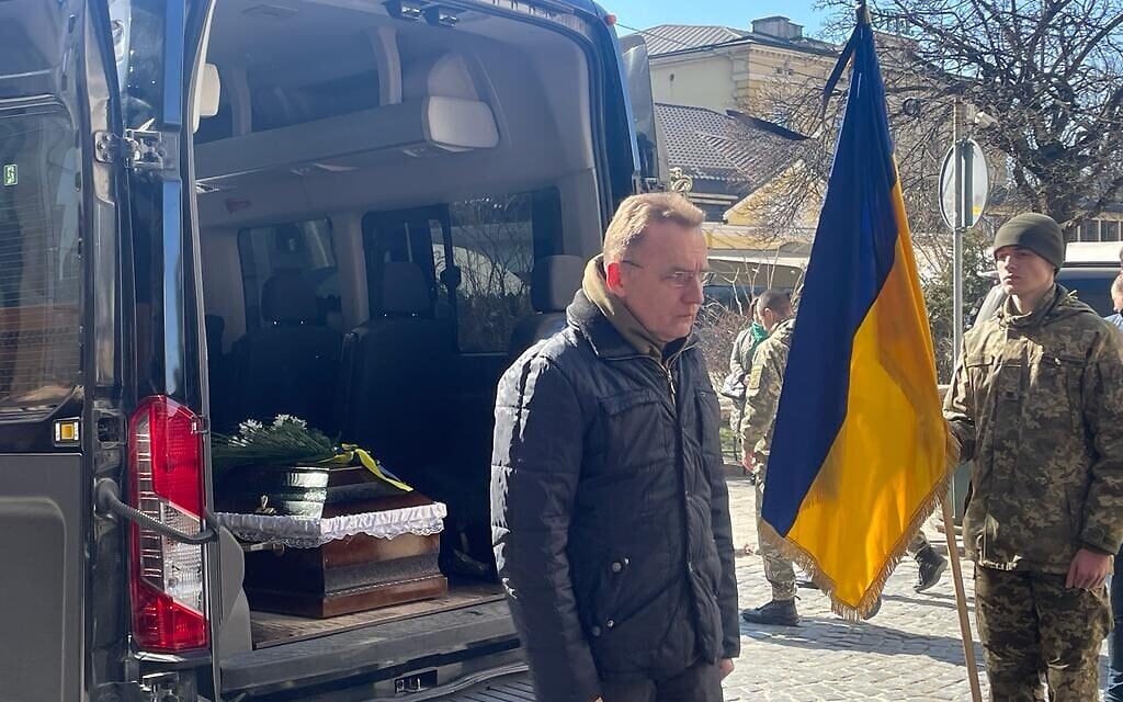 A mourner at the funeral of Colonel Serheii Kohan, killed earlier in the week by a Russian air strike on Yavoriv military base, Lviv, Ukraine, March 18, 2022. (Carrie Keller-Lynn/The Times of Israel)