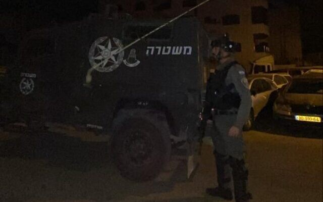 Border Police officers operate in the West Bank town of Abu Dis, March 23, 2022. (Israel Police) Border Police officers operate in the West Bank town of Abu Dis, March 23, 2022. (Israel Police)
