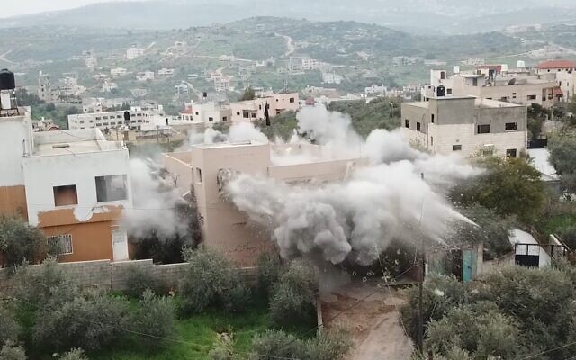 Israeli forces demolish the home of a suspected terrorist in the northern West Bank village of Silat al-Harithiya on March 8, 2022. (Israel Defense Forces) Israeli forces demolish the home of a suspected terrorist in the northern West Bank village of Silat al-Harithiya on March 8, 2022. (Israel Defense Forces)