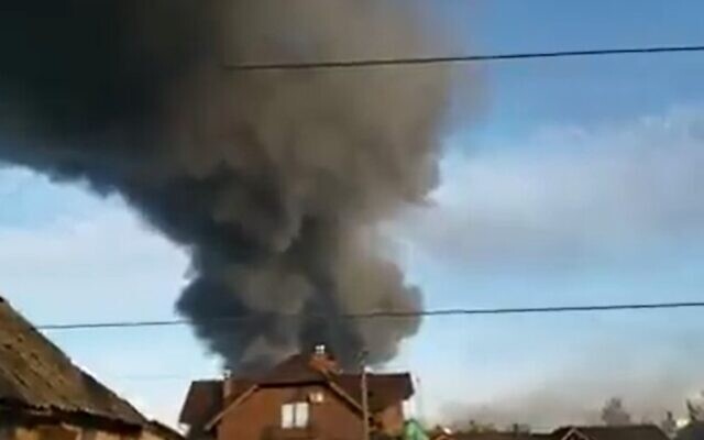An ammunition depot in Vasylkiv, home to a large airbase, near the capital Kyiv, was on fire Saturday, March 12, 2022, after being struck by Russsian missiles, Ukrainian authorities said. (Screenshot from video posted by Kyiv Oblast Police) An ammunition depot in Vasylkiv, home to a large airbase, near the capital Kyiv, was on fire Saturday, March 12, 2022, after being struck by Russsian missiles, Ukrainian authorities said. (Screenshot from video posted by Kyiv Oblast Police)