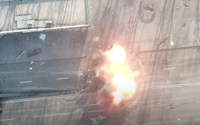 A Russian tank is hit by Ukrainian anti-tank missiles in Mariupol, amid Russia's invasion of Ukraine, March 2022. (Screenshot/Twitter)