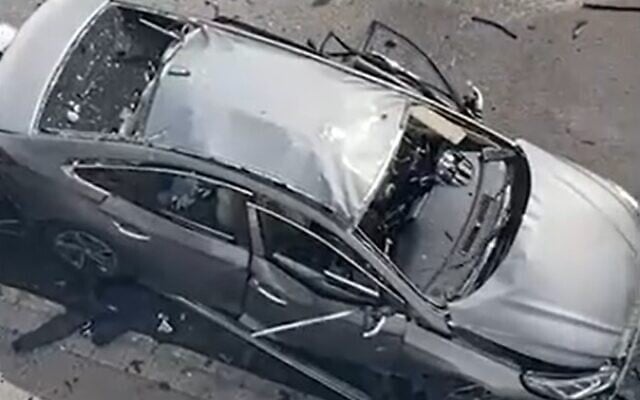 The aftermath of a car bombing in Haifa, on March 11, 2022. (Screengrab/Walla) The aftermath of a car bombing in Haifa, on March 11, 2022. (Screengrab/Walla)