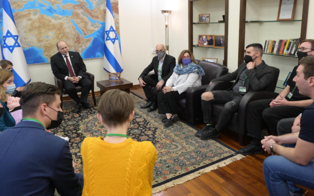 Prime Minister Naftali Bennett meets with a group of Ukrainian Masa participants, on March 1, 2022. (Amos Ben Gershom/GPO) Prime Minister Naftali Bennett meets with a group of Ukrainian Masa participants, on March 1, 2022. (Amos Ben Gershom/GPO)
