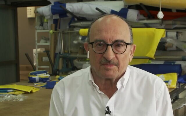Israeli flag maker Avi Marom speaks with Channel 12 news, March 6, 2022. (Screenshot) Israeli flag maker Avi Marom speaks with Channel 12 news, March 6, 2022. (Screenshot)