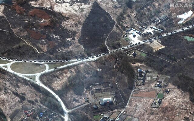 A satellite image taken by the US company Maxar, which it says shows part of a 40-mile-long Russian military convoy assembled northwest of Kyiv, Ukraine. (Satellite image ©2022 Maxar Tech/Agencies)