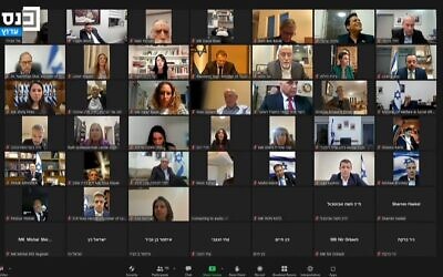 MKs watch Ukraine's President Volodymyr Zelensky's address, March 20, 2022. (Knesset channel screenshot)