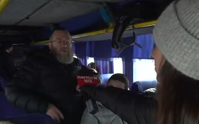 A man identified as Moshe speaks to a news reporter aboard a bus of Jewish refugees in Odesa, Ukraine, on March 1, 2022. (Screenshot/Channel 12) A man identified as Moshe speaks to a news reporter aboard a bus of Jewish refugees in Odesa, Ukraine, on March 1, 2022. (Screenshot/Channel 12)