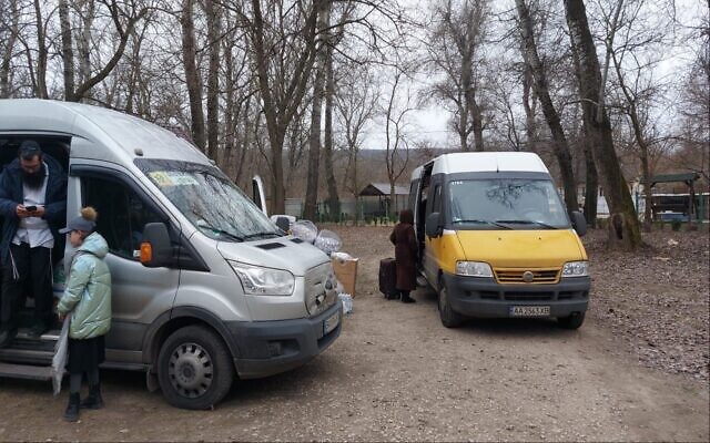 Families gather to evacuate via Anatvka, Ukraine Families gather to evacuate via Anatvka, Ukraine