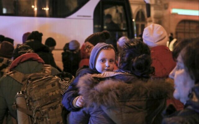 Women and children refugees fleeing the Russian invasion from Ukraine board a bus to Warsaw in Przemysl, Poland, March 1, 2022 (AP Photo/Visar Kryeziu) Women and children refugees fleeing the Russian invasion from Ukraine board a bus to Warsaw in Przemysl, Poland, March 1, 2022 (AP Photo/Visar Kryeziu)