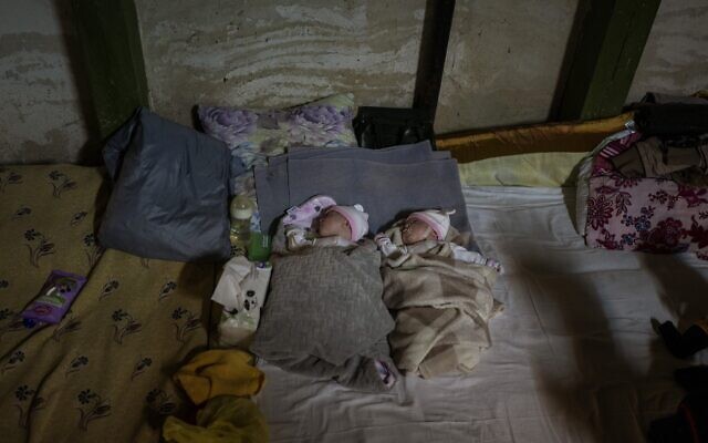 Newborn twin brothers sleep in a basement used as a bomb shelter at the Okhmadet children's hospital in central Kyiv, Ukraine, February 28, 2022. (AP Photo/Emilio Morenatti) Newborn twin brothers sleep in a basement used as a bomb shelter at the Okhmadet children's hospital in central Kyiv, Ukraine, February 28, 2022. (AP Photo/Emilio Morenatti)