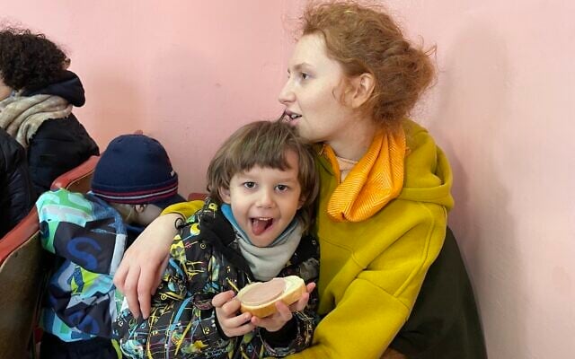 Yanna Chernega and Leonid, 4, at the reception center in Otaci, Moldova, run by Christians for Israel, March 15, 2022. (Sue Surkes/Times of Israel) Yanna Chernega and Leonid, 4, at the reception center in Otaci, Moldova, run by Christians for Israel, March 15, 2022. (Sue Surkes/Times of Israel)