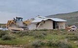 Israeli officials demolish a stracture at the illegal West Bank outpost of Maoz Esther, March 21. 2022. (screenshot)