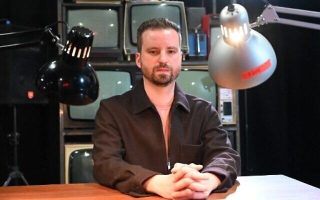 Marton Gulyas, manager of online tv channel 'Partizan' poses for a photo at their studio in Budapest on March 30, 2022. (ATTILA KISBENEDEK / AFP) Marton Gulyas, manager of online tv channel 'Partizan' poses for a photo at their studio in Budapest on March 30, 2022. (ATTILA KISBENEDEK / AFP)