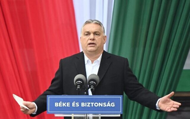 Hungarian Prime Minister Viktor Orban reacts on stage during the closing campaign session of the FIDESZ party, in Szekesfehervar, Hungary on April 1, 2022.(Attila KISBENEDEK/AFP)
