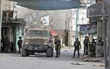 Israeli troops clash clash with Palestinians in the West Bank city of Hebron on April 1, 2022. (Mosab Shawer/AFP)