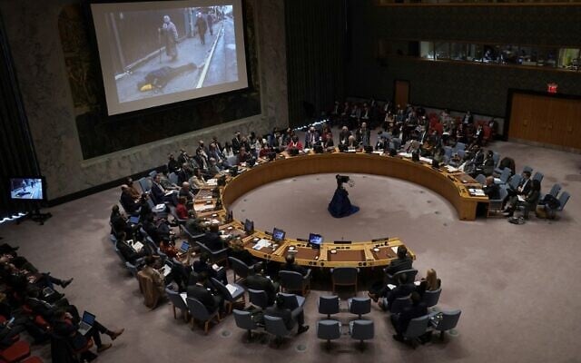 Photos from the war in Ukraine are shown on a screen as Ukrainian President Volodymyr Zelensky addresses a meeting of the United Nations Security Council in New York City on April 5, 2022. (TIMOTHY A. CLARY / AFP) Photos from the war in Ukraine are shown on a screen as Ukrainian President Volodymyr Zelensky addresses a meeting of the United Nations Security Council in New York City on April 5, 2022. (TIMOTHY A. CLARY / AFP)