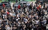 Mourners carry the body of Islamic Jihad member Ahmed as-Saadi, who was killed during a gun battle with Israeli troops in the Jenin refugee camp in the West Bank, on April 9, 2022. (Jaafar Ashtiyeh/AFP)