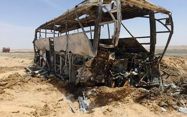 A picture shows the scene of a bus accident which occurred in early hours of April 13, 2022 when the vehicle collided with a car as it was transporting tourists on a road between Aswan and the famed Abu Simbel temple further south. (AFP)