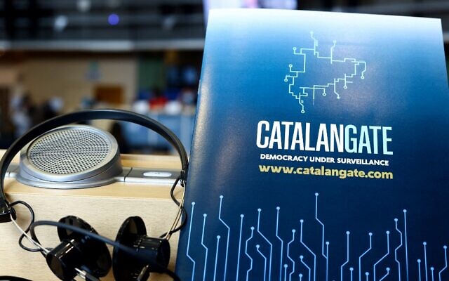 This picture taken on April 19, 2022 at the EU Parliament in Brussels shows a document entitled 'Catalangate democracy under surveillance,' during a press conference by the exiled former Catalan leader and member of European Parliament. (Kenzo Tribouillard/AFP) This picture taken on April 19, 2022 at the EU Parliament in Brussels shows a document entitled 'Catalangate democracy under surveillance,' during a press conference by the exiled former Catalan leader and member of European Parliament. (Kenzo Tribouillard/AFP)